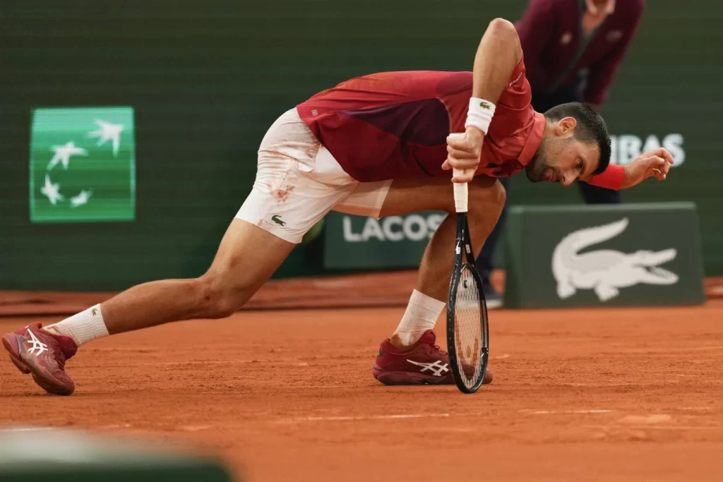 Novak Djokovic Withdraws from French Open Due to Knee Injury, Loses No. 1 Rankingillustration