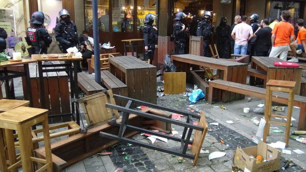 Violence Erupts as Netherlands Fans Clash with England Supportersillustration