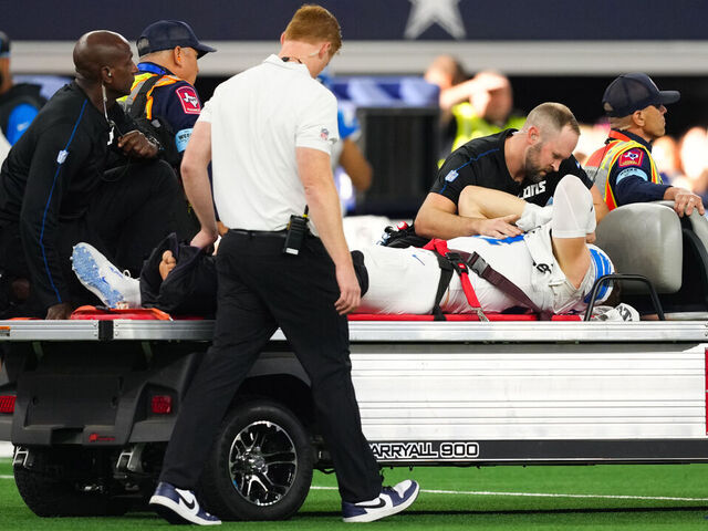 Lions' Hutchinson Carted Off with Broken Tibia